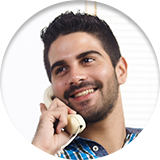 Smiling man talking on the phone